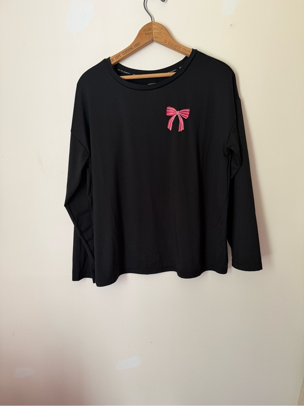 Black Long-Sleeve Tee with Pink Bow Accent